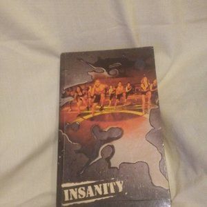 Insanity workout program with 13 DVDs, used
